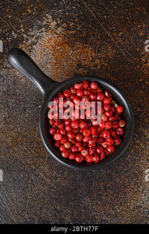 Dry Organic Red rose Peppercorns Ready to Grind Up top view overhead Stock Photo