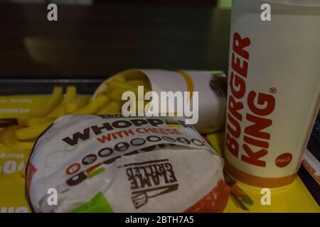 'RAK, RAK/UAE - 2/14/2020: Burger King Whopper Meal on a tray a high calorie meal leading to American and global obesity and public health problems' Stock Photo