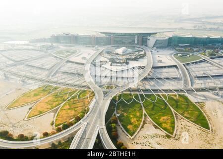 Aerial view of the green Meydan racecourse with UAE map in the middle ...