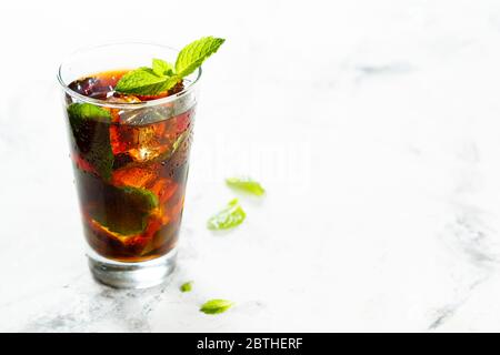 Refreshing strawberry ice tea with fresh mint Stock Photo