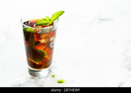 Refreshing strawberry ice tea with fresh mint Stock Photo