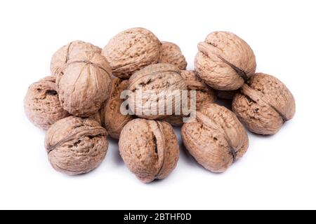 Group of big whole walnuts isolated on white background Stock Photo