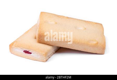 Group of pastry cookies with cream and jam filling isolated over white background Stock Photo