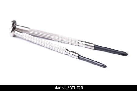 Set of small screwdrivers for small screws isolated on white background Stock Photo