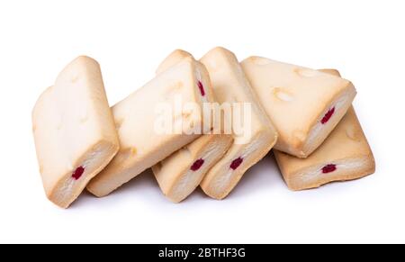 Group of pastry cookies with cream and jam filling isolated over white background Stock Photo