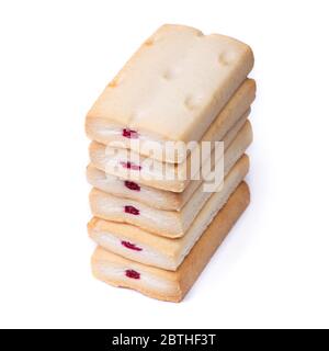 Group of pastry cookies with cream and jam filling isolated over white background Stock Photo