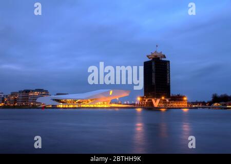 AMSTERDAM - DECEMBER 10: The Eye Film Institute Netherlands at the Ij after sunset in Dec. 10, 2012 in Amsterdam, The Netherlands. Stock Photo