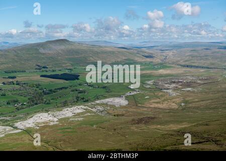 View across Ribblehead towards Whernside in the Yorkshire Three Peaks area seen from the summit of Ingleborough Stock Photo