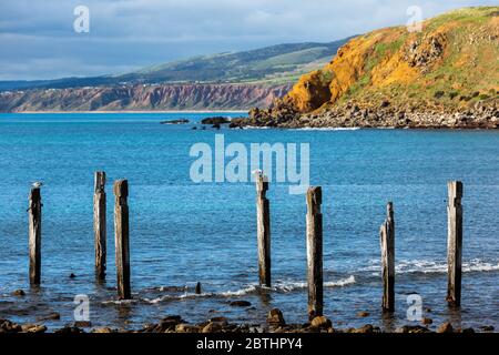 The iconic jetty ruins located on the Myponga beach on the Fleurieu Peninsula South Australia on the 24th May 2020 Stock Photo