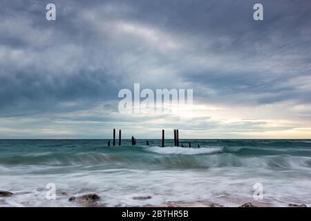 The iconic port willunga jetty ruins at high tide and long exposures located on the Fleurieu Peninsula South Australia on the 26th May 2020 Stock Photo