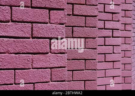 Purple painted brick wall Stock Photo