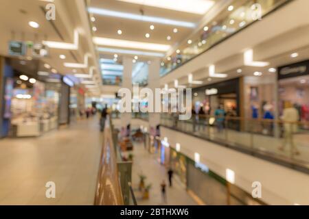 Abstract blur and bokeh beautiful luxury shopping mall and department store interior for background Stock Photo