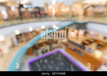 Abstract blur and bokeh beautiful luxury shopping mall and department store interior for background Stock Photo