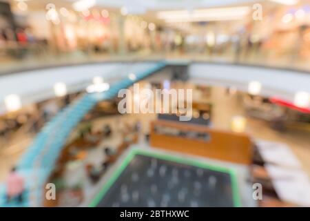 Abstract blur and bokeh beautiful luxury shopping mall and department store interior for background Stock Photo