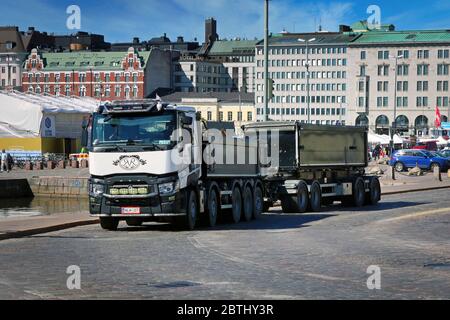 Customised Renault Trucks C of Sorakeisari Oy pulls gravel trailer in city traffic on a beautiful day near Kauppatori, Helsinki, Finland. May 26, 2020 Stock Photo