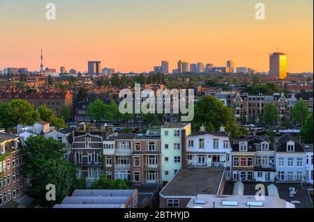 Beautiful cityscape looking over the city of Amsterdam in the Netherlands at sunset Stock Photo
