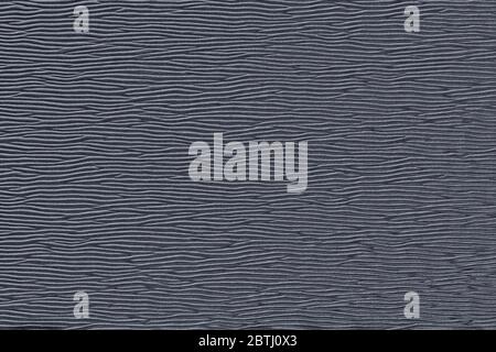 Abstract pattern of black wavy lines. Trendy plastic or paper texture background. Stock Photo