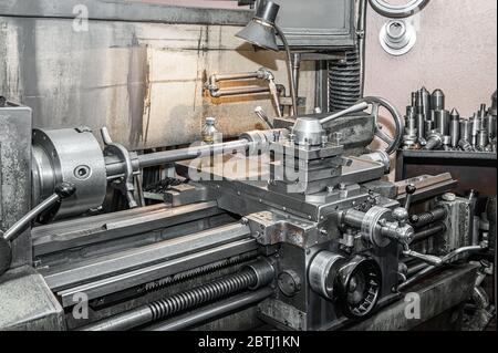 old Metalworking machine, manufactured in the middle of the last century, is still in good condition. The use of old technologies in times of crisis a Stock Photo