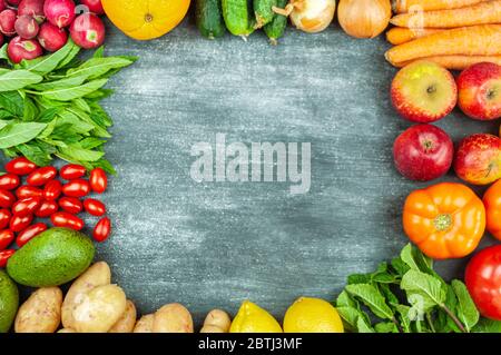Flat lay of multicolored raw vegetables on a black background, square food frame. Local products for healthy cooking. Organic fruits and vegetables Stock Photo