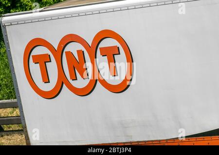 TNT HGV Haulage delivery trucks, lorry, transportation, truck, cargo carrier, vehicle, European commercial transport industry, distribution service M6 at Manchester, UK Stock Photo