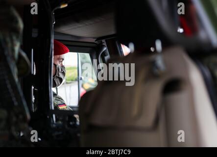 26 May 2020, Saxony, Frankenberg: During the presentation of the rollout of the Battle Management System, a soldier of the German Armed Forces sits in a Mowag Eagle 4 The system has been introduced in the force base since the beginning of April 2020 and in the army since 11 May 2020. The system forms the backbone of the Bundeswehr's digitalization and enables the deployed units to capture a complex situation picture on the screens in the vehicles. All information on the situation of the own and enemy forces is merged and digitally evaluated and displayed to the participating units. Photo: Jan Stock Photo
