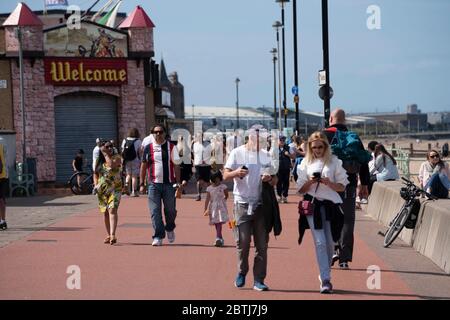 Portobello, Scotland, UK. 26 May 2020. Portobello beach and promenade were relatively quiet despite sunny warm weather. Police patrols on foot were low key and officers were not asking many members of the public to move on.  Iain Masterton/Alamy Live News Stock Photo