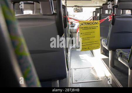 Notice on public transport bus with taped off area behind driver to keep distancing between passengers during phase two of the de-escalation of the st Stock Photo