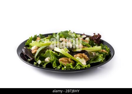 Fresh Waldorf salad with lettuce, green apples, walnuts and celery isolated on white background Stock Photo