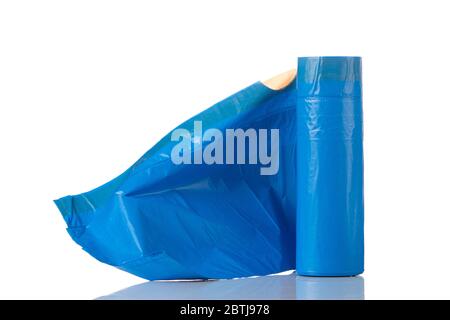 Roll of blue garbage bags on a white background Stock Photo