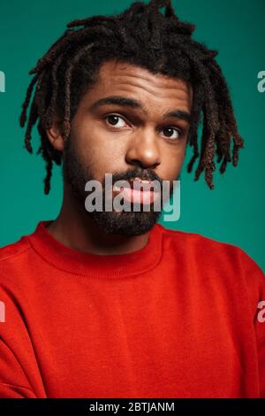 African Man With Dreadlocks Standing Over Isolated Background Shouting 