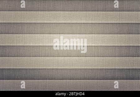 Grey Pleated Shades Textile Window Covers Photo Close Up Background. Stock Photo