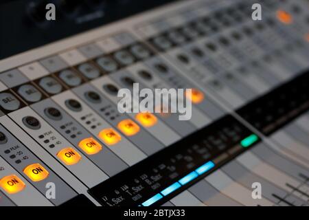 Digital sound mixing console at recording studio. Selective focus. Stock Photo
