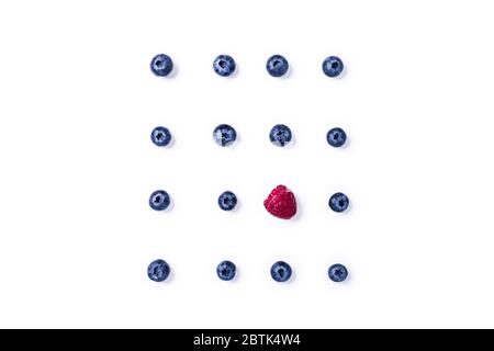 Pattern with raspberry and blueberries on isolated white background. Stock Photo