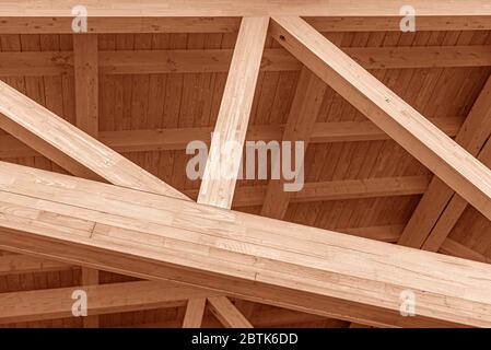 The construction of the wooden roof. Stock Photo