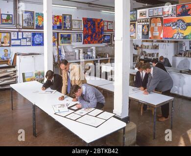 Teacher and pupils drawing in art class, Surrey, England, United Kingdom Stock Photo