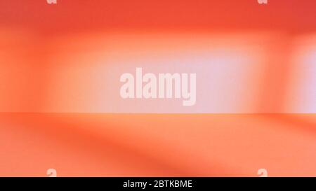 Empty red studio space with deep windows shadow. Sparse panoramic template and background Stock Photo
