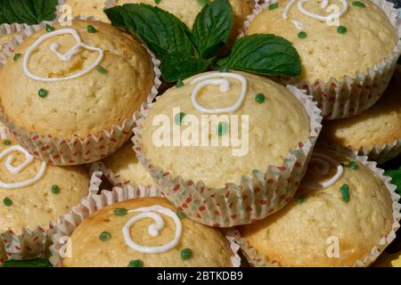 closeup of lemon muffins with mint ready to eat Stock Photo