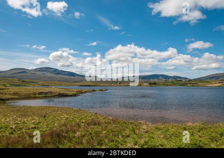 Panorama of Loch Mealt, isle of Skye, Scotland. Concept: typical Scottish landscapes Stock Photo