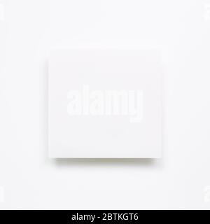 White memo pad, empty paper on white background. top view, copy space Stock Photo