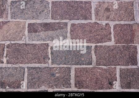 Image of a stone-paved floor with rectangular shapes that form a perfect pattern with rough textures Stock Photo
