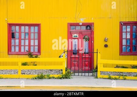 Yellow house in Ushuaia, Tierra del Fuego, Patagonia, Argentina Stock Photo