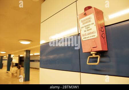 Emergency Brake at subway station in Berlin - Pull handle to stop the train Stock Photo