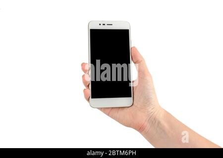 Woman hand holding phone isolated mockup on white background. Female arm with a smartphone template with black screen. Stock Photo