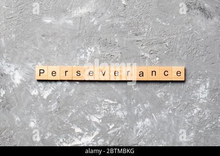 perseverance word written on wood block. perseverance text on table, concept. Stock Photo