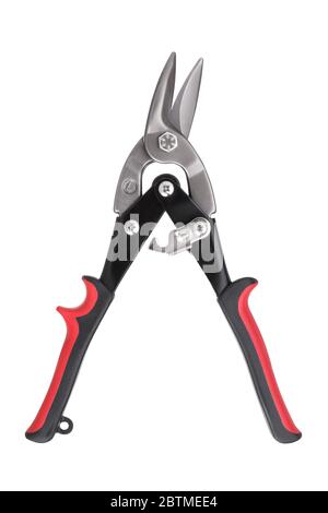 Opened scissors for metal with red and black rubber handle isolated on a white background Stock Photo