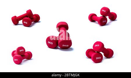 Set of red dumbbells isolated on white background. A pair of red neoprene dumbbells. Home gym equipment for exercise at home. Weight training Stock Photo
