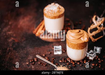 Still life of creamy corean dalgona coffee with coffee beans Stock Photo