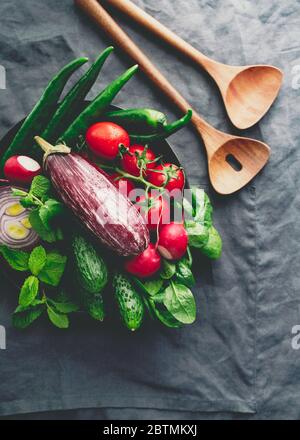 Various fresh colorful vegetables on a table. Top view. Stock Photo