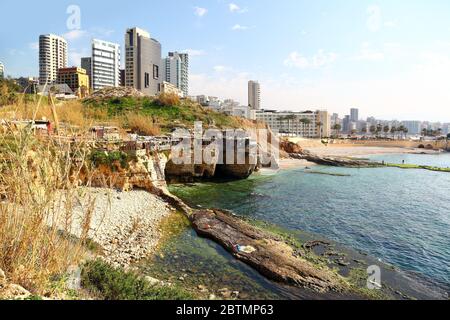 Hidden Beirut: A view of the skyline from the coast at the Dalieh. Stock Photo
