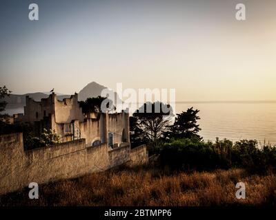 enjoying the sunset on the coast of sicily with a beautiful italian villa Stock Photo